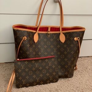“Never full” MM Louis Vuitton bag and wristlet.